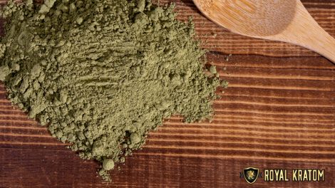 Royal Kratom powder next to serving spoon